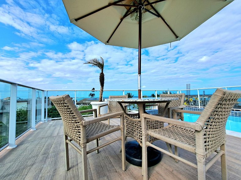 Flat elegante a poucos passos da praia