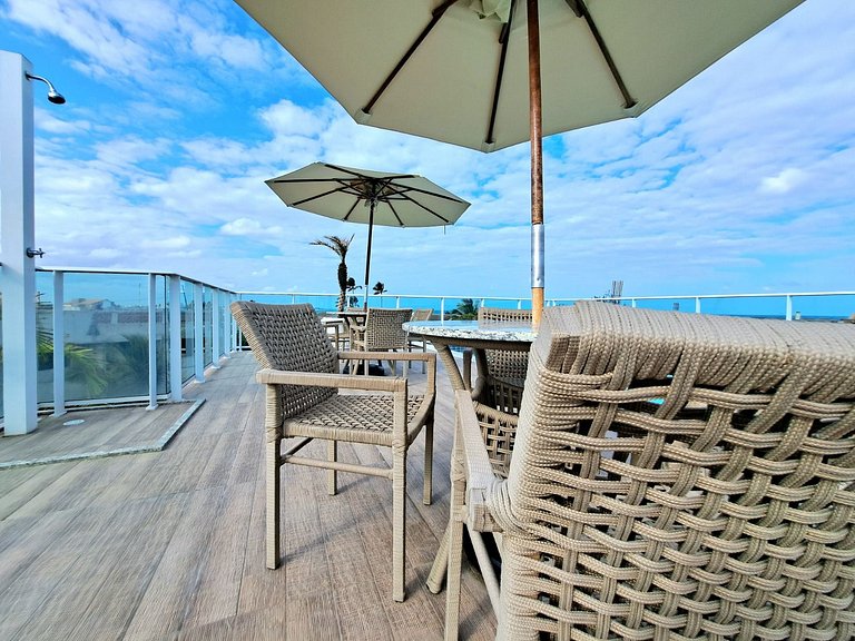 Flat elegante a poucos passos da praia