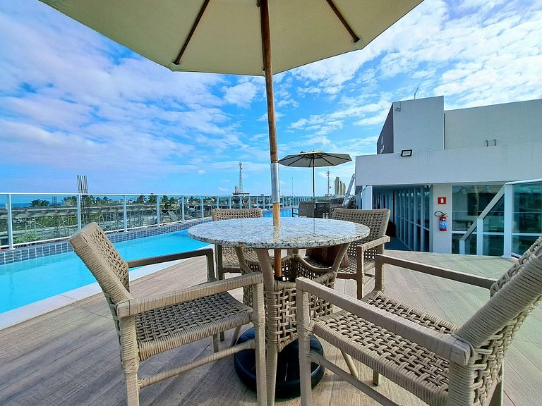Flat elegante a poucos passos da praia