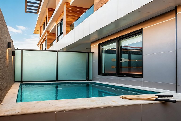 On the sand with private heated pool