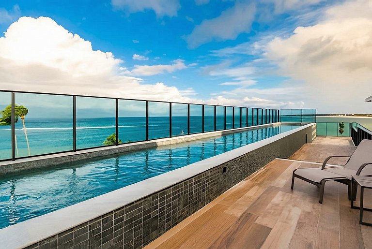 On the sand with private heated pool