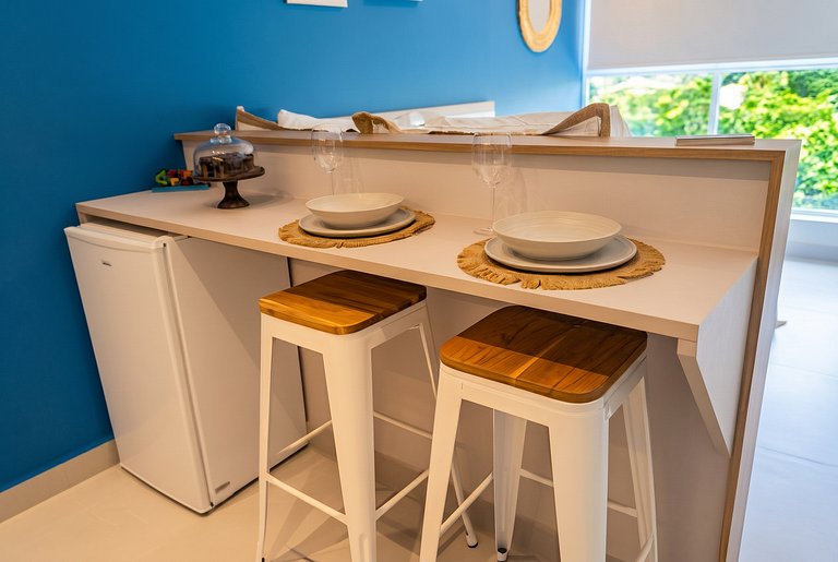 Flat elegante a poucos passos da praia