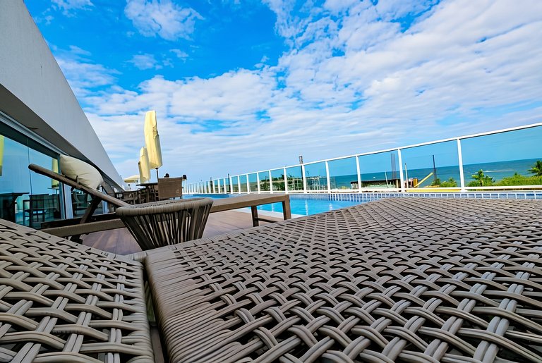 Flat elegante a poucos passos da praia