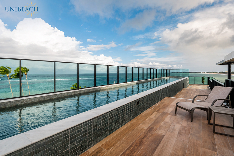 Flat de luxo pé na areia
